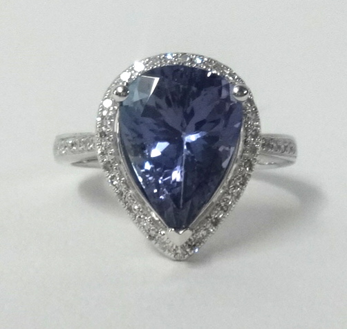A 14k white gold and diamond ring set with a pear cut tanzanite approx 3.76cts, diamonds approx 0.