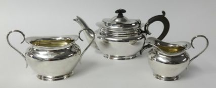 A George V 3 piece silver tea service, maker 'W.N', Birmingham, approx 21.14ozs.