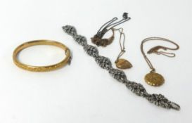A yellow metal bangle, 9ct gold lockets and a marcasite bracelet.