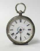 A silver open face fob watch with key wind movement, the back plate stamped 0.935.