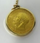 A George V 1914 gold sovereign on 9ct pendant and chain.