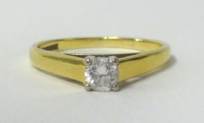 An 18ct yellow gold solitaire ring, set with a round cut diamond, approx 0.25cts, finger size N.
