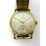 Record, a gents 9ct gold wristwatch with arabic numerals, sub-second dial, fifteen jewel movement