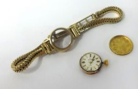 Omega, a ladies 18ct wristwatch, the back plate No.7115731 with a 9ct bracelet.