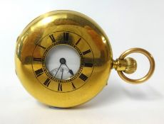An 18ct gold half hunter keyless pocket watch, with roman numerals and sub-second dial.