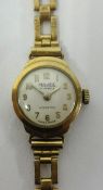 Majex, a ladies traditional 9ct gold wristwatch, gross weight approx 13gms.