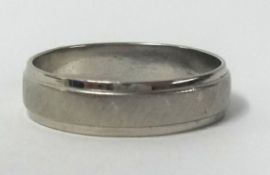 A platinum wedding band, approx 3.1gms.