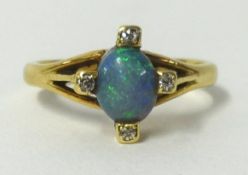 A 9ct opal and diamond 4 stone ring, finger size J.