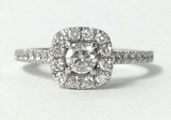 A Neil Lane, fine 14ct white gold diamond engagement ring, set with central round cut diamond approx