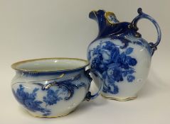A Royal Doulton blue and white toilet jug and bowl