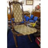 A Victorian faux rosewood folding chair.