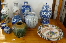 A Chinese blue and white ginger jar and cover, with 6 character marks, a blue and white baluster