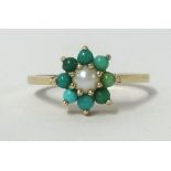 A 9ct turquoise and pearl cluster ring, finger size M.