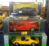 Burago, Ferrari model, Maisto, Ertl & other large scale models, boxed (5).