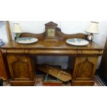 A 19th century mahogany pedestal sideboard (in three sections).