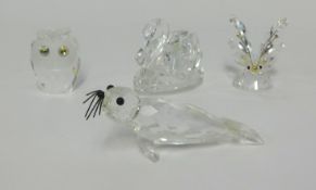 Swarovski, four pieces, butterfly, seal, owl and swan, boxed (4).