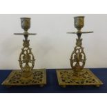 A pair of Victorian William Townshend aesthetic period gilt brass candlesticks