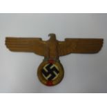 A 20th century cast alloy plaque, modelled as a WWII German Third Reich Nazi wall plaque in the form