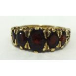 A 9ct garnet 5 stone ring, finger size K.