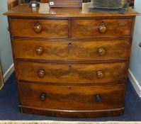 A Victorian mahogany bow fronted chest fitted with five drawers