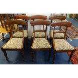 A Victorian mahogany dining table and a matched set of six 19th century mahogany framed dining