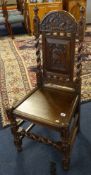 A Victorian carved oak side chair, with carved panel inscribed '1691'.