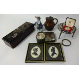 A quantity of stamps, ornaments, jugs, trivet, postcards and other items.