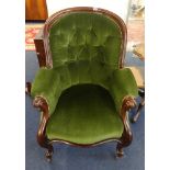 A Victorian mahogany framed armchair.