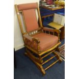 An Edwardian rocking chair.