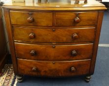 A Victorian mahogany bow fronted chest fitted with five drawers.