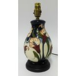 Moorcroft, a modern pottery table lamp decorated with lilies.