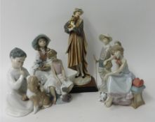 Five Lladro figures and another (6).