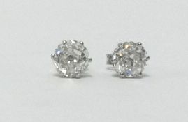 A pair of fine large diamond studs, weighing approx 2.80cts, set in 18ct white gold.
