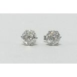 A pair of fine large diamond studs, weighing approx 2.80cts, set in 18ct white gold.