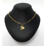 A 9ct gold necklace with fish charm approx 10.2gms.