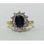 An 18ct sapphire and diamond cluster ring, with copy of insurance valuation , dated 2010 at £2,570.