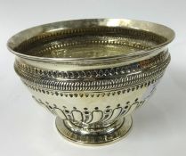 A Victorian silver bowl with half fluted embossed design, approx 11.80oz, diameter 19cm.