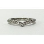 Rare Pink, a diamond and platinum half band eternity ring of wishbone design, finger size H.