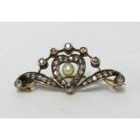 Diamond set heart and scroll design brooch, 40mm loing by 17mm (at widest)