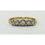 An 18ct five stone diamond set ring, finger size Q.