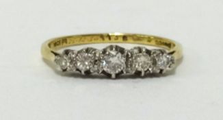 An 18ct five stone diamond set ring, finger size Q.