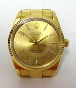 Rolex, a gents 18ct gold cased Oyster Perpetual Chronometer, wristwatch and bracelet, guarantee