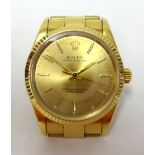 Rolex, a gents 18ct gold cased Oyster Perpetual Chronometer, wristwatch and bracelet, guarantee