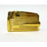 Ronson, adonis a 9ct gold sheath lighter, cased.