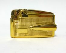 Ronson, adonis a 9ct gold sheath lighter, cased.