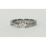 A modern diamond and platinum solitaire ring, the stone approx .34cts, 10 set, finger size H, bought