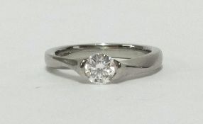 A modern diamond and platinum solitaire ring, the stone approx .34cts, 10 set, finger size H, bought