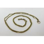 A 9ct long yellow metal guard chain, approx 15.5gms.