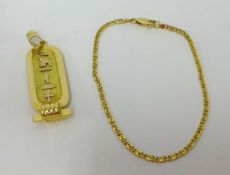 An Egyptian high grade gold pendant and chain, sold as 18ct approx 15.2gms.