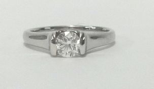 An 18ct diamond solitaire ring set in white gold, the stone approx 0.50cts, finger size J.